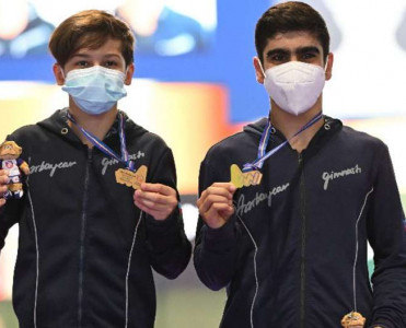 AÇ-dən 1 qızıl, 1 bürünclə