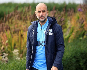 Mançester Siti Qvardiola ilə yeni müqavilə imzaladı